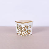 Large square white concrete box with graffiti in copper and gold leaf lid - Fastoun